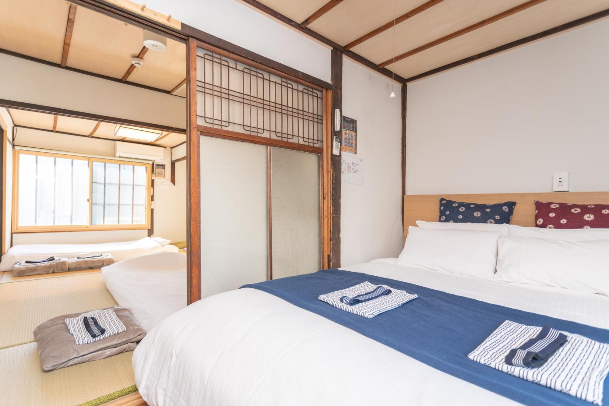 Guesthouse Oneworld Shijo四条京町屋 — Photos 1