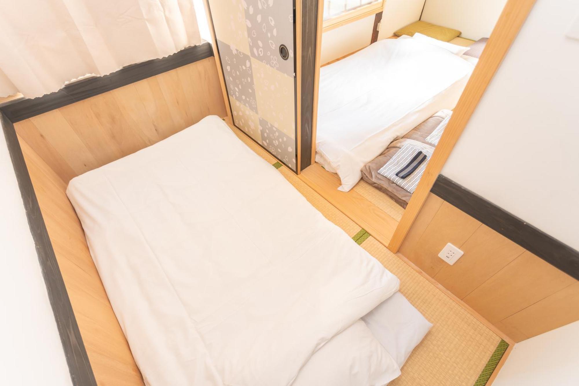 Guesthouse Oneworld Shijo四条京町屋 — Photos 2